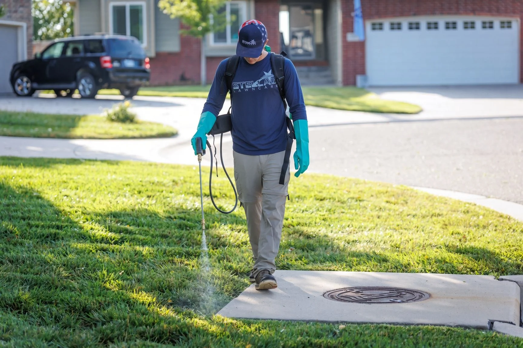 A Wichita residential lawn with thick, uniform green turf after professional weed control treatment. No visible crabgrass, dandelions, or broadleaf weeds are present in the treated yard.
